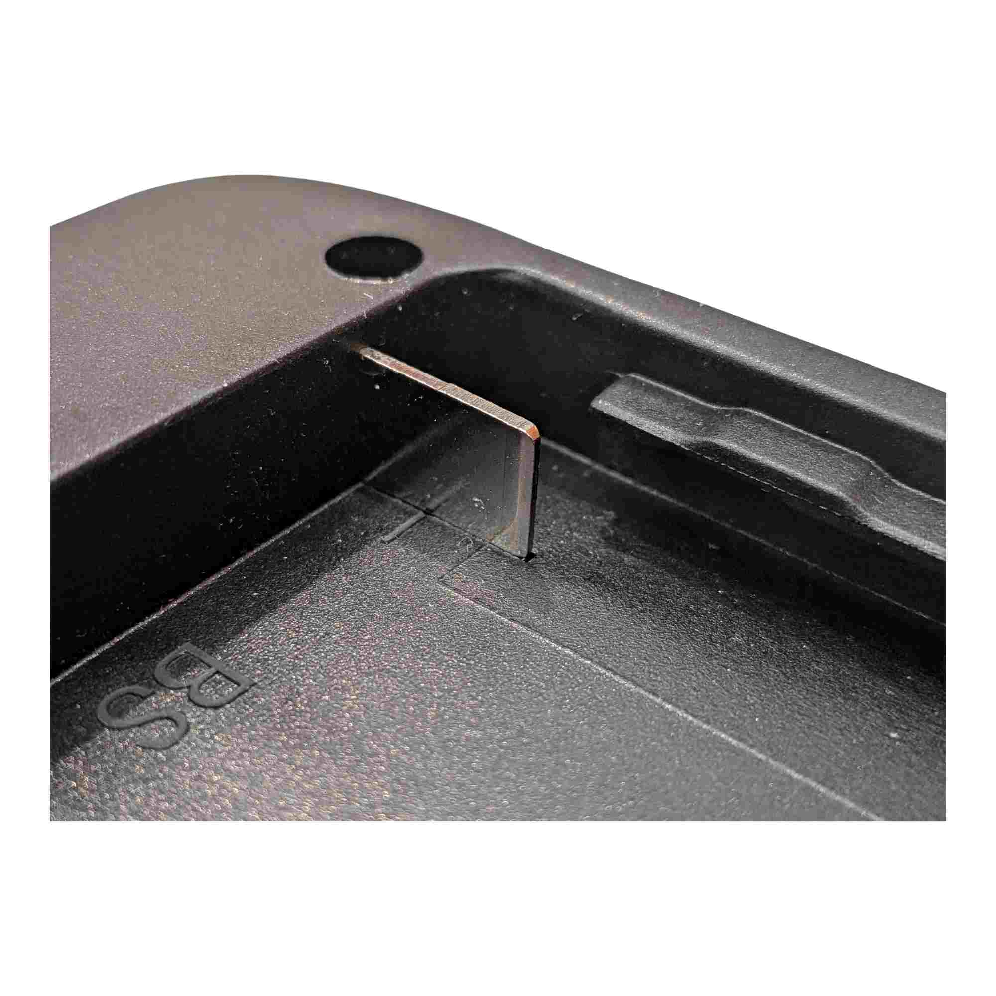 Bosch 18V GBA (Blue) to Makita 18V LXT battery adapter - close-up of one copper terminal in the Makita tool-side rail