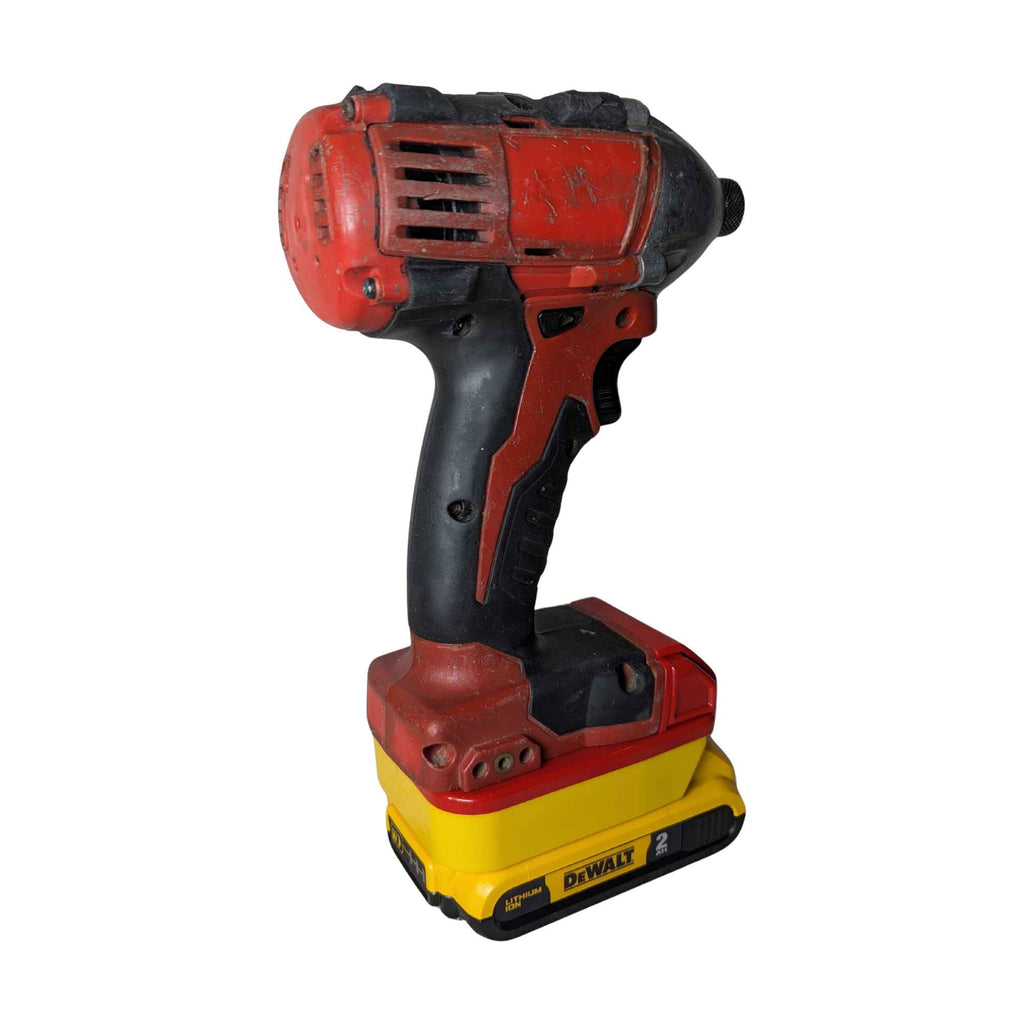 DeWalt 20V MAX to Milwaukee M18 battery adapter - installed on a Milwaukee impact driver, opposite side