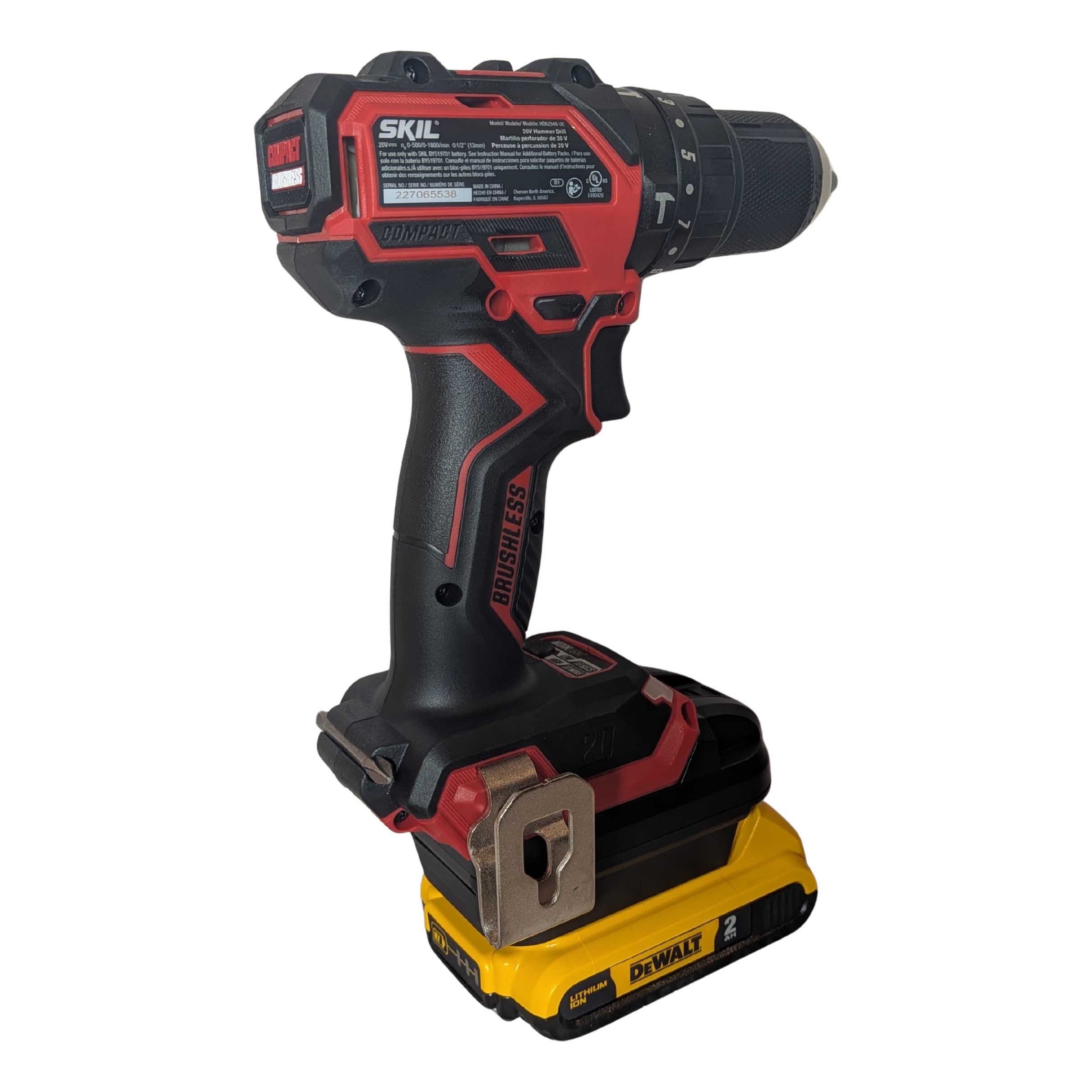 DeWalt 20V MAX to SKIL 20V PWR CORE battery adapter - rear view installed on a SKIL hammer drill, seated on the battery pack