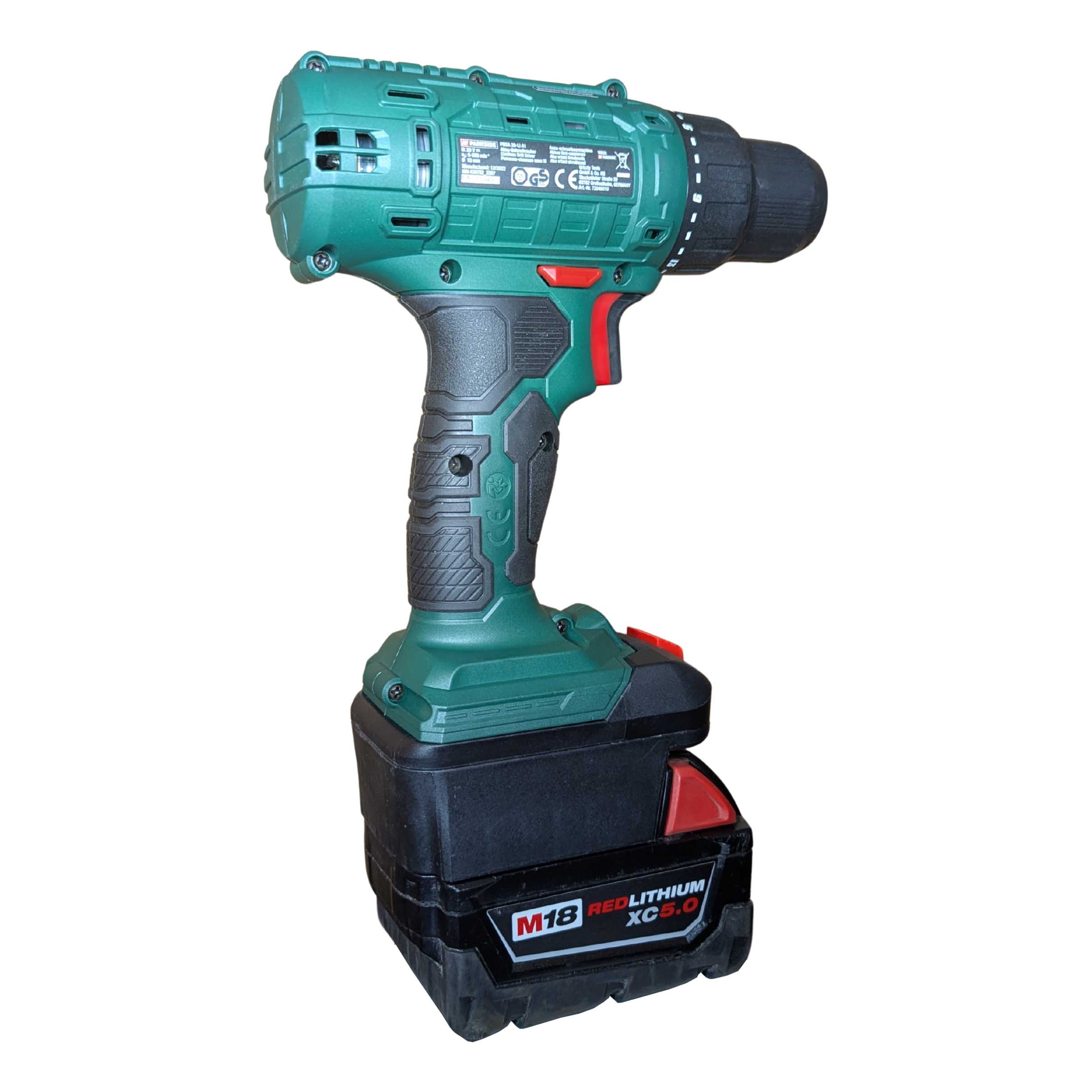 Milwaukee M18 to Parkside X20V battery adapter - Parkside drill installed on the adapter, rear view with rating label