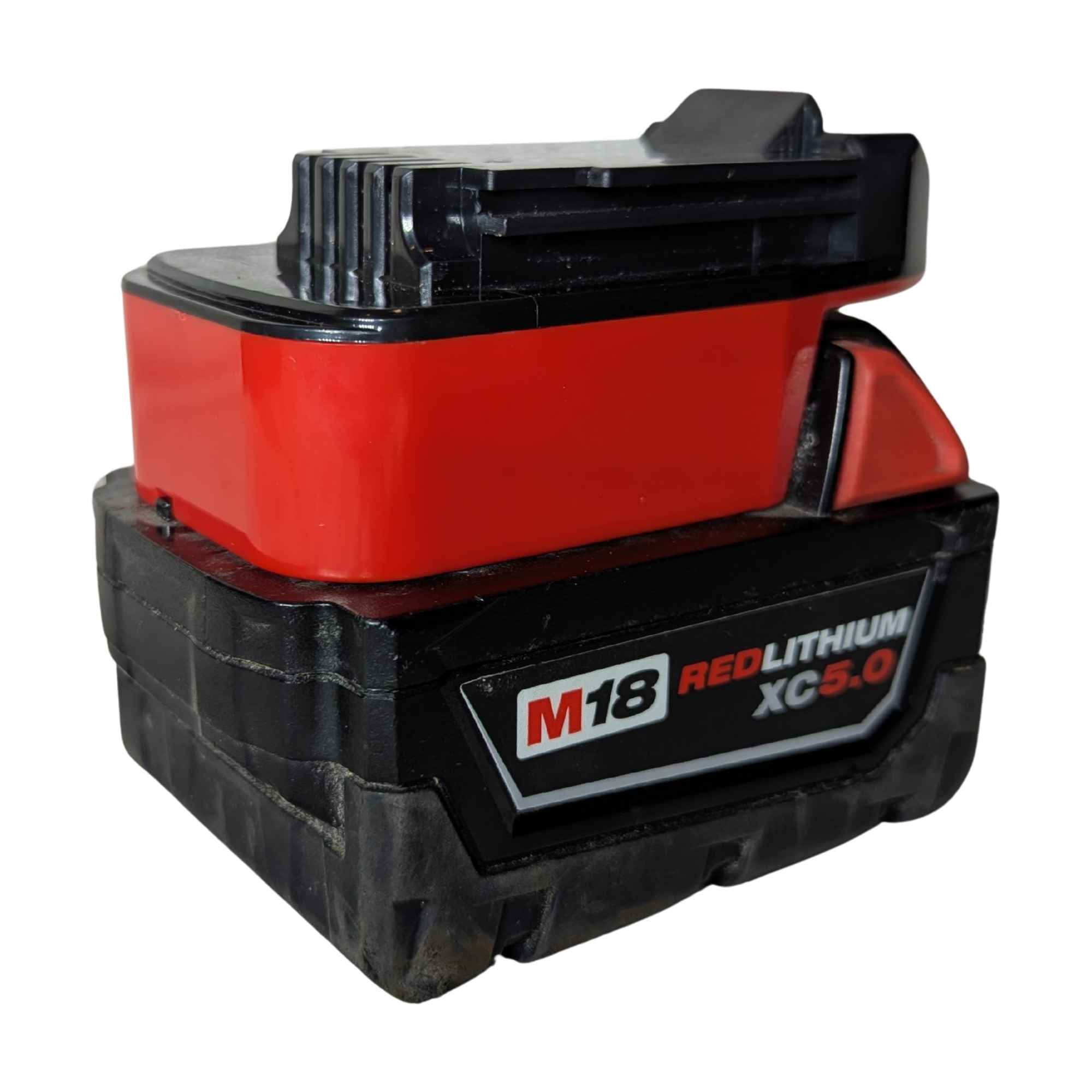 Milwaukee M18 to Porter Cable 20V battery adapter - fitted to the Milwaukee M18 battery, tool-side rail above the red body