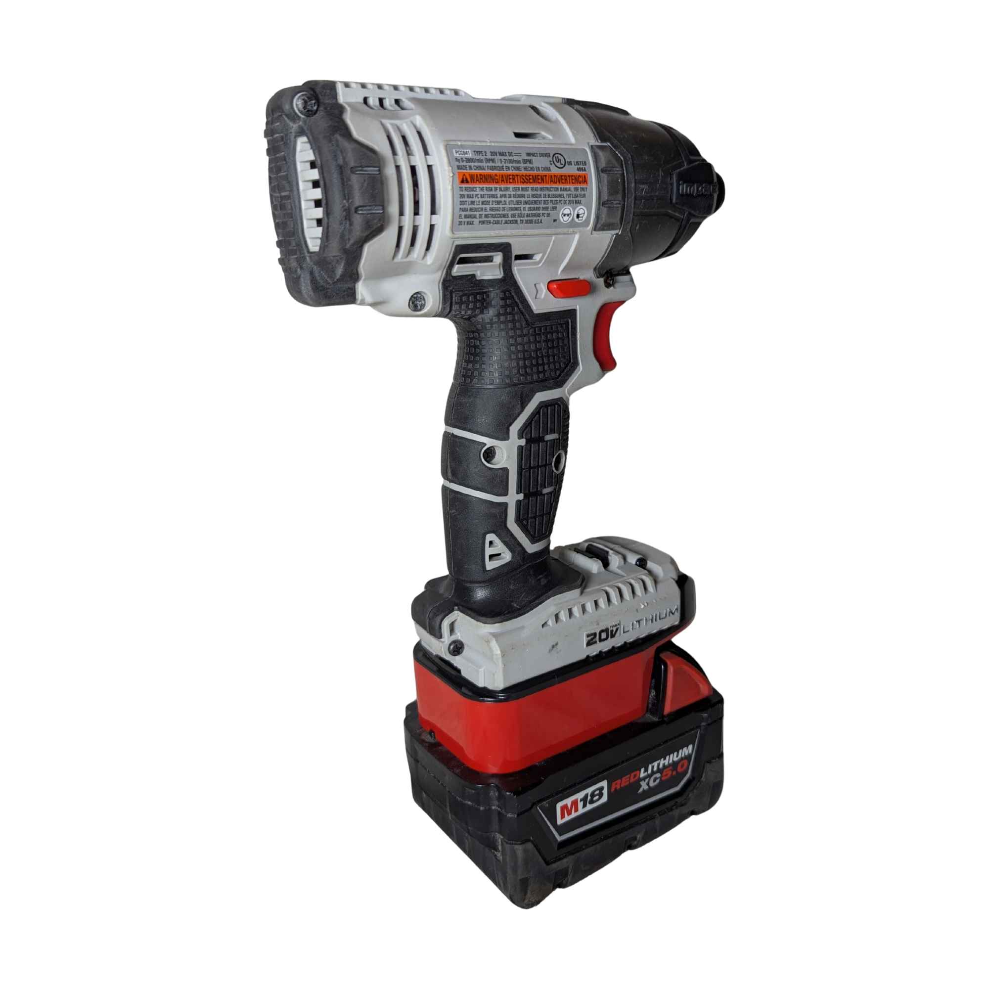 Milwaukee M18 to Porter Cable 20V battery adapter - fitted to the Milwaukee M18 battery, rear view, impact driver installed