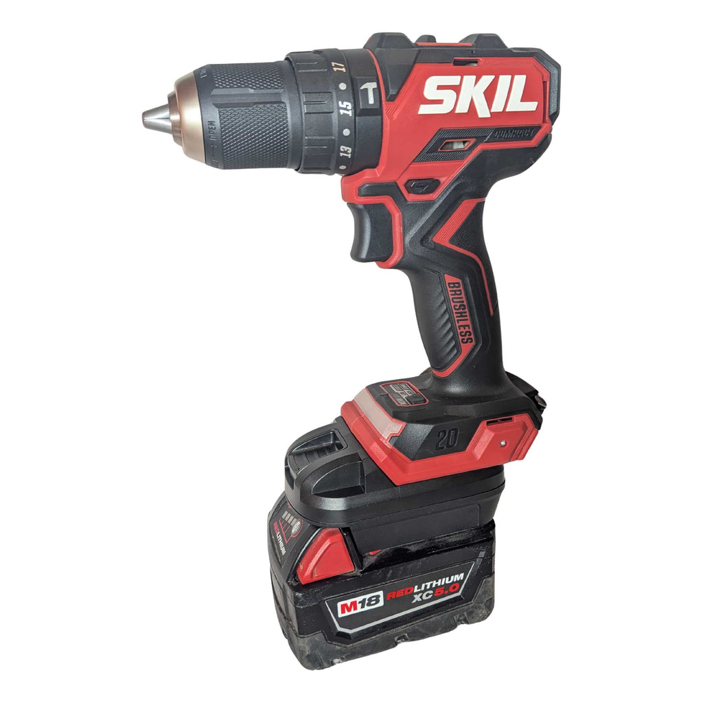 Milwaukee M18 to SKIL 20V PWR CORE battery adapter - front view installed on a SKIL hammer drill, seated on the battery pack