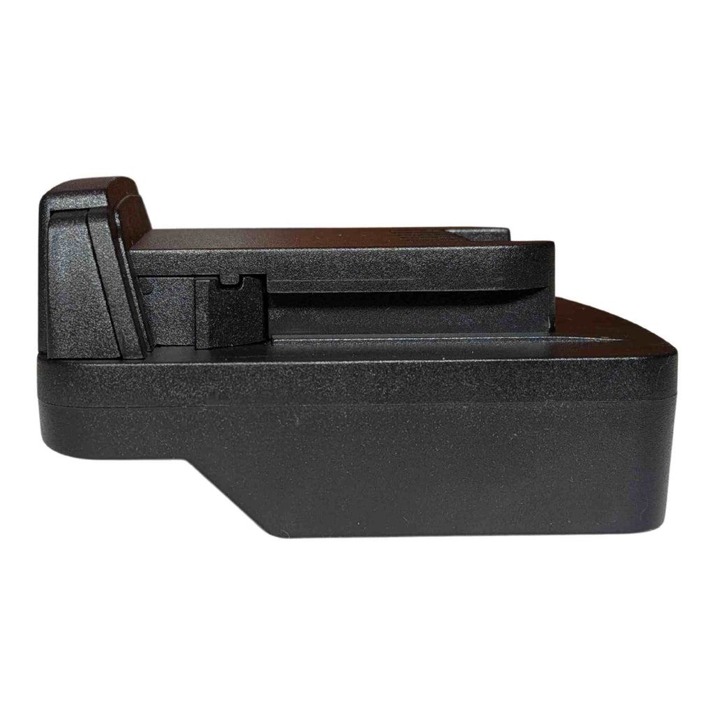 Parkside X20V to Milwaukee M18 battery adapter - side view showing the tool-side plateau above the body and the stepped skirt