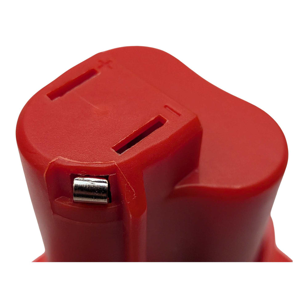 DeWalt 20V MAX to Milwaukee M12 battery adapter - close-up of the Milwaukee tool-side stem, slots with moulded + and - marks
