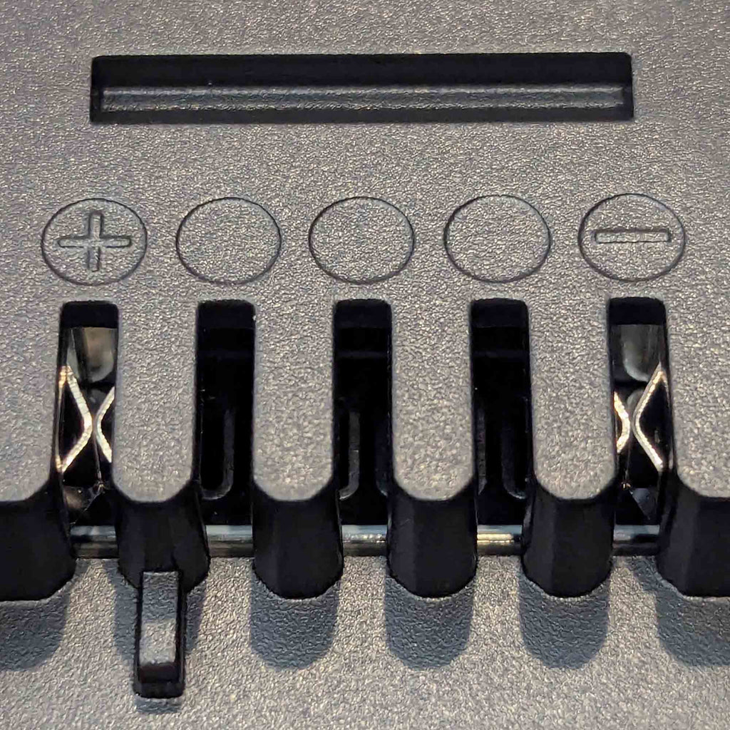 Makita 18V LXT to Ozito 18V PXC battery adapter - close-up of the Ozito tool-side connection with copper spring contacts
