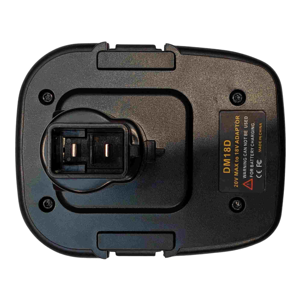 Milwaukee M18 to DeWalt 18V Ni-Cd battery adapter - tool-side terminal head from directly above, two contact openings