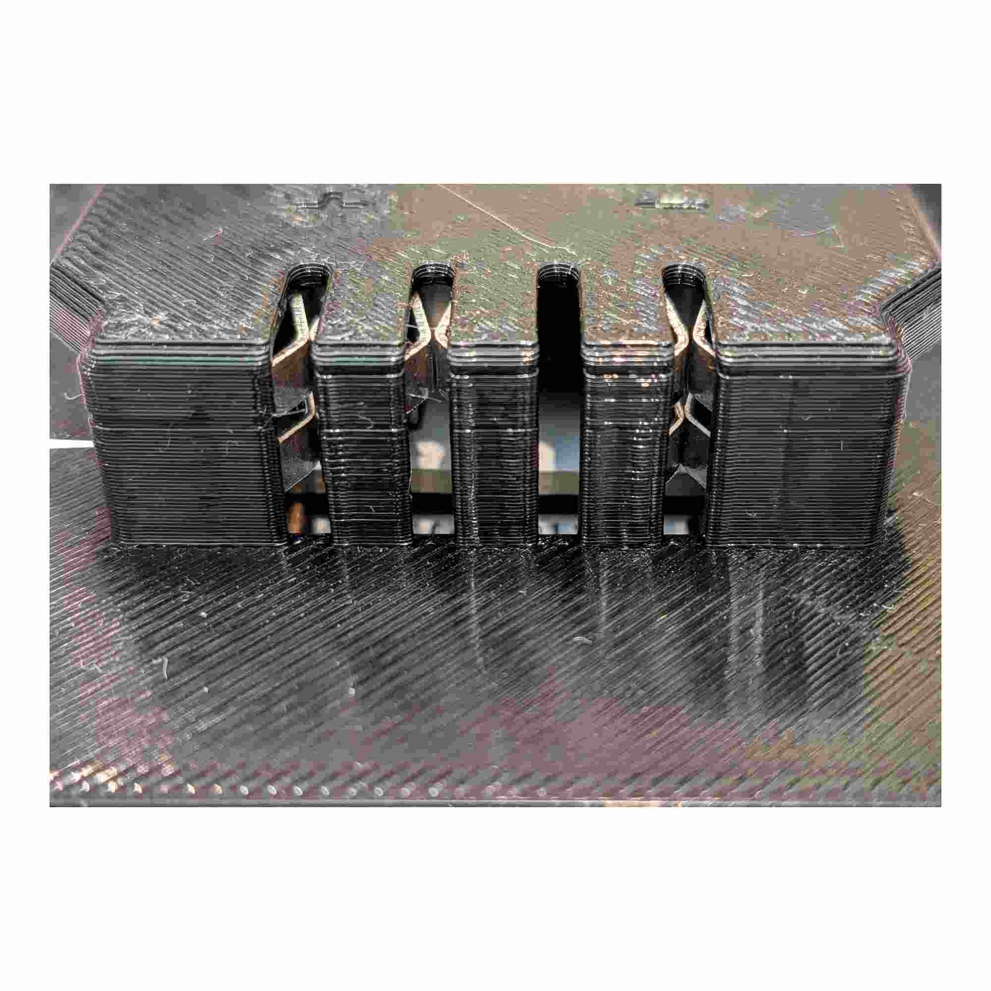 Milwaukee M18 to Earthquake 20V XT battery adapter - close-up of the Earthquake tool-side terminal block